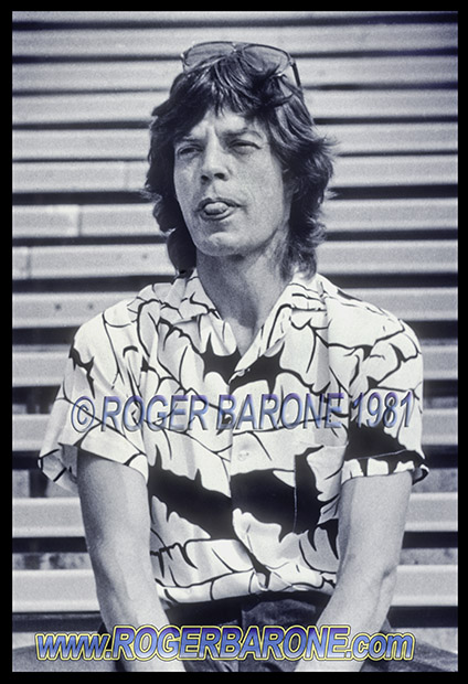 mick jagger playfully poses for photographers at JFK Stadium Stones press conference august 1981 photo by roger barone