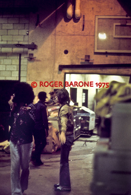 Mick Jagger & Bill Preston arrive backstage at the Spectrum Arena before the Rolling Stones concert in Philly © roger barone 1975