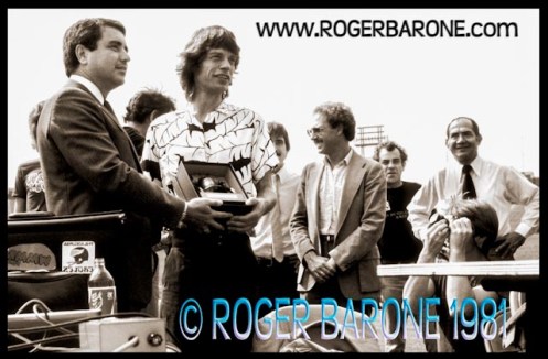 jagger_doran_jfk_web Rolling Stones Mick Jagger receives a replica Liberty Bell in Philadelphia from Dick Doran (8/26/81) © roger barone 1981