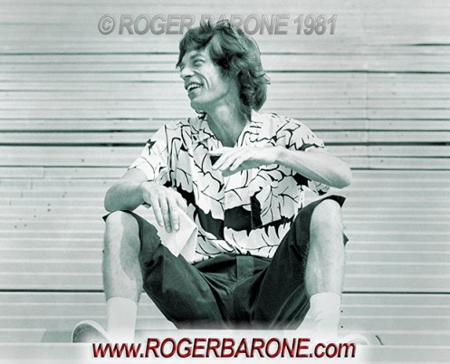 Mick Jagger posing for photograhers at Rolling Stones JFK Stadium press conference (8/26/81) © roger barone