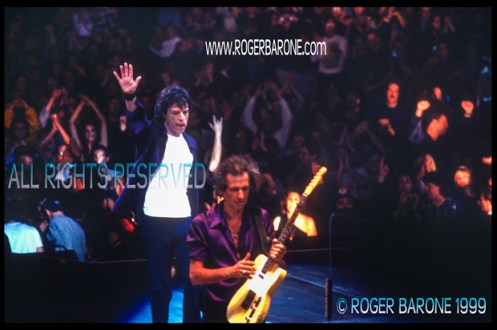 Mick Jagger and Keith Richards exit First Union Center stage after Rolling Stones concert. (3/15/99) © roger barone 199