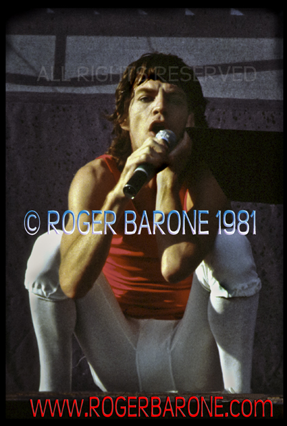 Mick Jagger squatting on Rolling Stones stage at JFK Stadium Philly (925/81) photo: roger barone