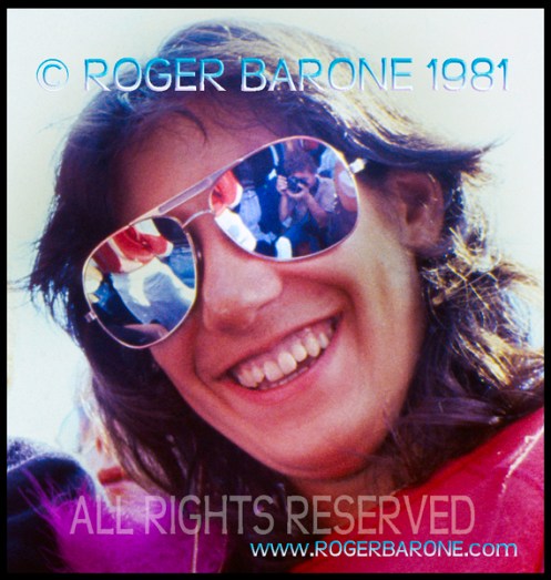 Photographer Roger Barone reflection in glasses of Rolling Stones' fan at JFK Stadium (9/25/81) © roger barone 1981