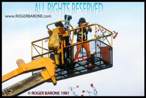 Mick Jagger drops roses on JFK Stadium Stones' Concert Crowd, September 25, 1981. © Roger Barone 1981