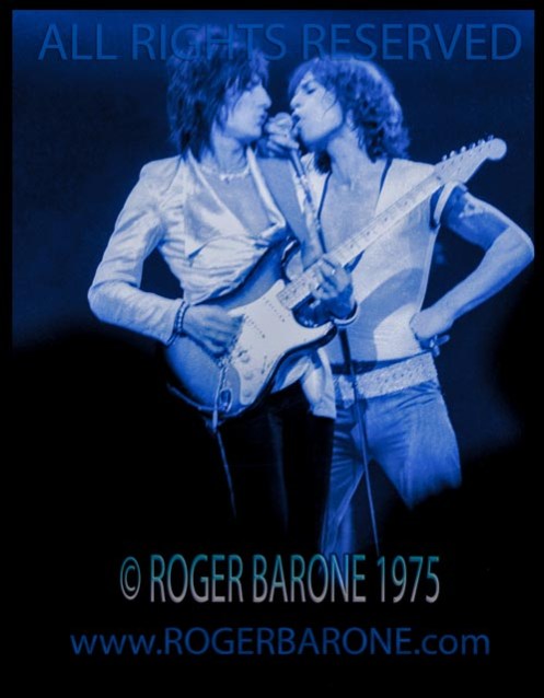 Rolling Stones Mick Jagger and Ronnie Wood performing at Spectrum Arena in Philly. June 29, 1975, photo:© roger barone 