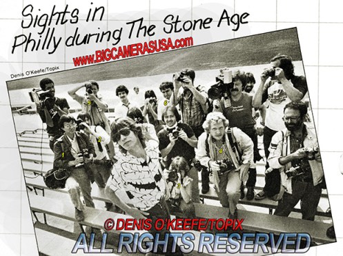 Mick Jagger poses with Philadelphia Press photographers: roger barone upper left. August 24, 1981 © Denis O'Keefe 1981