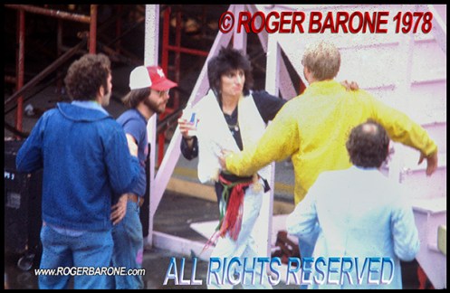 Rolling Stone Ronnie Wood being restrained at JFK Stadium 1978 photo by roger barone