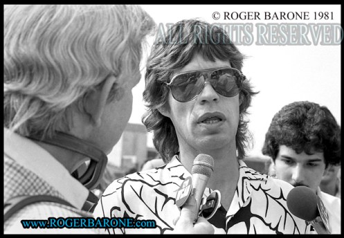 Mick Jagger interviewed at STONES JFK Stadium press conference; © roger barone 1981