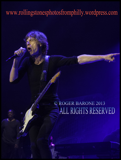 Mick Jagger plays fender stratocaster guitar at Wells Fargo Center Philly. June 21, 2013, © roger barone