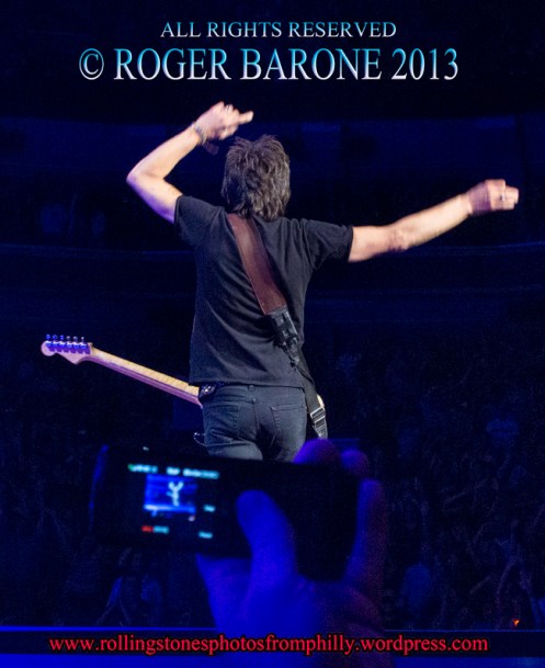 Ronnie Wood facing audience Wells Fargo Center rolling Stones , © roger barone 2013