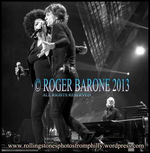 Mick Jagger, Lisa Fischer and Chuck Levall Wells Fargo Center, rolling stones. june 21, 2013 © roger barone