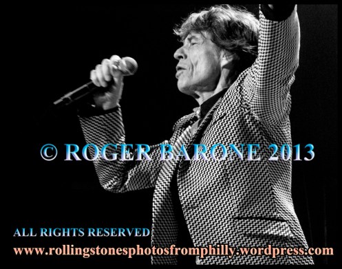 Mick Jagger sings "Get Off My CLoud" opening song. Wells Fargo Center, june 21, 2013, © roger barone