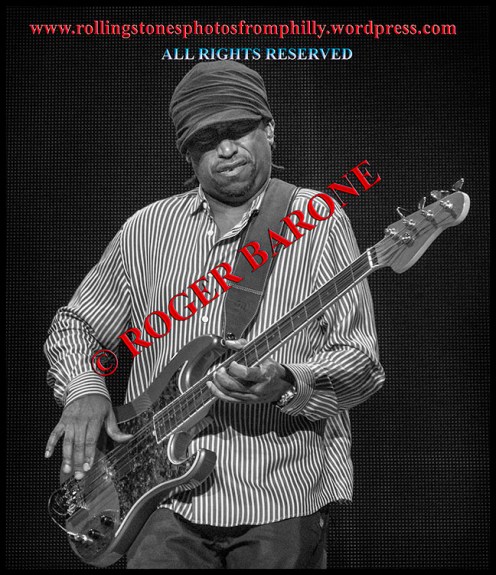 Darryl Jones playing bass guitar with rolling stones in Philadelphia, June 21, 2013 photo by roger barone