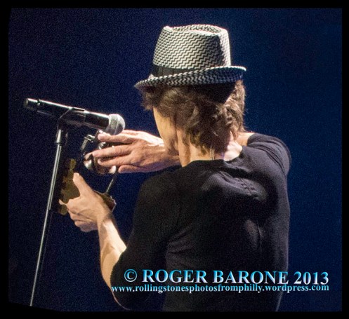 Mick Jagger shows off the mini Liberty Bell he received from the City of Philadelphia in a special moment before one of the Stones' concerts at the Wells Fargo Center. © Roger Barone 2013