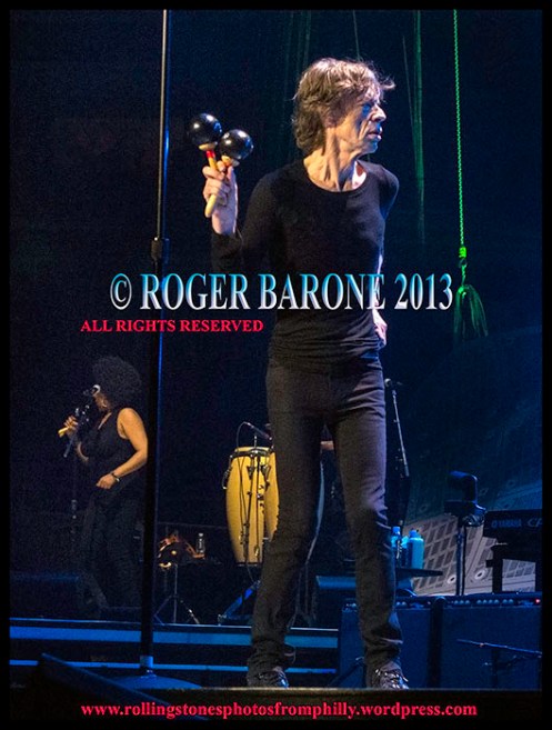 Mick Jagger playing maracas on "Can't You Hear Me Knockin" Wells Fargo Center, June 21, 2013, photo by roger barone