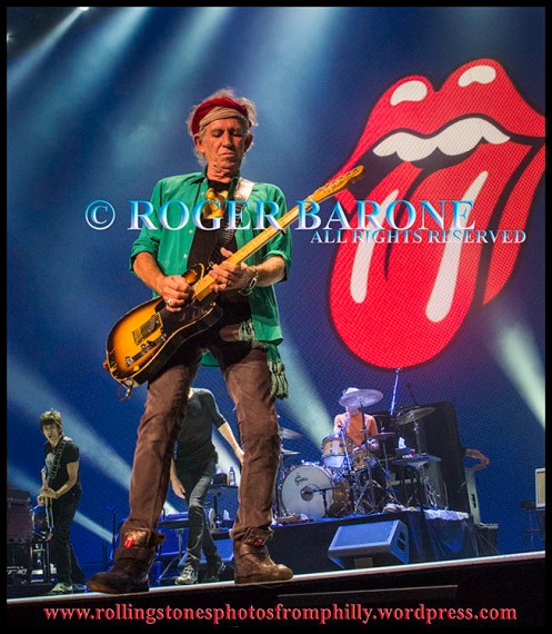 Keith Richards and Rolling Stones' Tongue logo, philadelphia, june 21, 2013, photo by roger barone