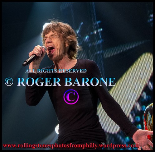 Mick Jagger singing "Satisfaction" at the Wells Fargo Center, june 21, 2013, photo by roger barone