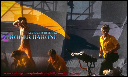 Mick Jagger of the Rolling Stones dances across JFK Stadium stage, September 26, 1981, photo© roger barone