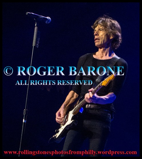 Mick Jagger plays black Fender stratacaster guitar on Miss You. Philly june 21, 2013. photo by roger barone