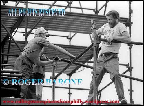 Mo and "Chappy" O'Shea setting up scaffolding for the Rolling Stones at JFK Stadium, june 12, 1978. photo by roger barone