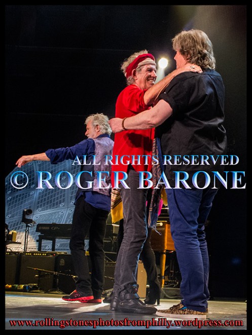 Keith Richards and Mick Taylor hugging after Rolling Stones show in Philly. June 21, 2013. photo by roger barone