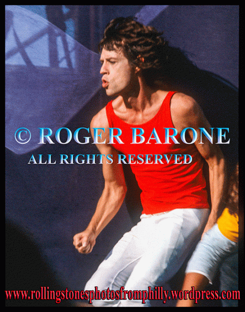 Mick Jagger red shirt JFK Stadium. August 25, 1981. photo by roger barone