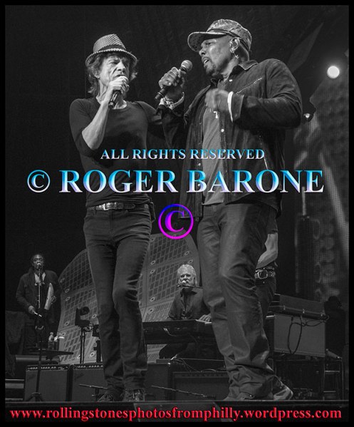 Mick Jagger and Aaron Neville singing "Under the Boardwalk" Philly, june 21, 2013. photo by roger barone